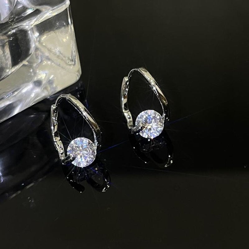 Boucles d'oreilles géométriques en diamant