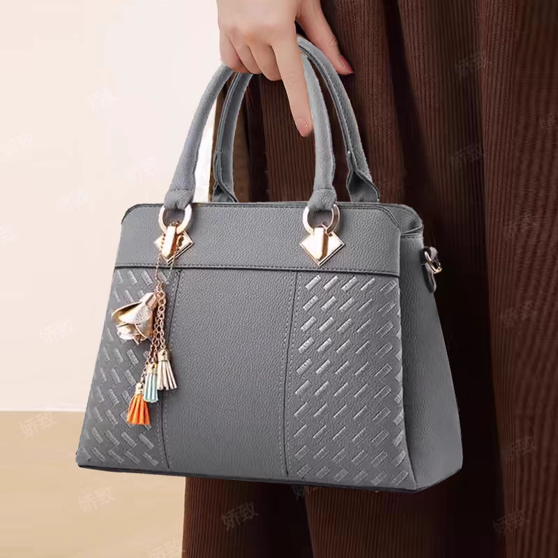 Sac à main tendance avec franges